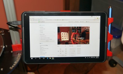 Tablet with mounting arm displayed in OctoPrint