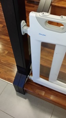 BAM!  Solid baby gate that doesn't swing around at the bottom.