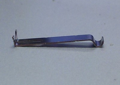Factory end stop switch lever, side view, with contact curve on right