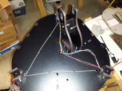Note the screw head under the front screw hole on the outer leg.