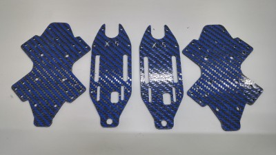 Custom frame milled from custom blue hybrid carbon fiber.